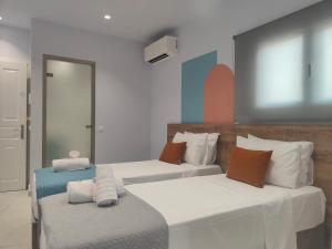 Giường trong phòng chung tại Corfu Port Studios +75 ảnh
