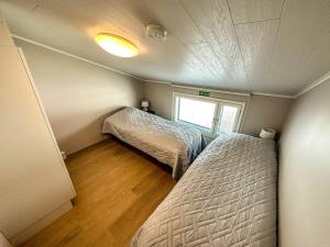 Postel nebo postele na pokoji v ubytování Vuokatti Hideaway by Hilla Villas