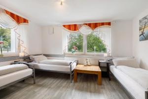 Postel nebo postele na pokoji v ubytování Ferienwohnung Bailey