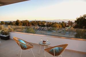 Balkón nebo terasa v ubytování Riviera Escape Penthouse Suites