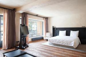 Un pat sau paturi într-o cameră la Kokhta Bakuriani