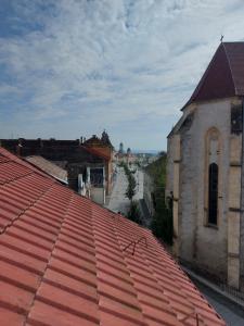 an overhead view of a red roof of a building at Apartament Adriano in Turda