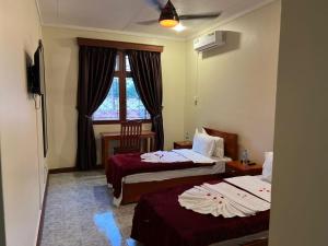 Кровать или кровати в номере B&B HOTEL +89 фотографий