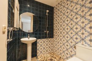 a bathroom with a sink and a mirror at Masia Boutique con Infinity Pool in Calvinyá +93 photos