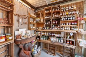 a store with wooden shelves and a pharmacyacistacist sidx sidx sidx sidx at Im Vital Art Naturgarten in Zweibrücken