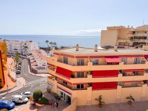 an aerial view of a city with a building at Blue Ocean Oasis in Puerto de Santiago