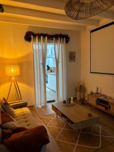 Χώρος καθιστικού στο L’escapade, appartement cozy +5 φωτογραφίες