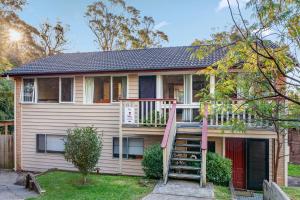 a house with a staircase in front of it at 3-Bed Pet-Friendly Retreat Near Wentworth Falls in Wentworth Falls
