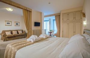 Ein Bett oder Betten in einem Zimmer der Unterkunft Abano Ritz Hotel Terme