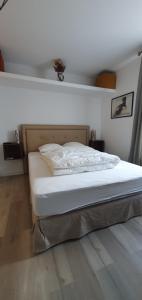 Ένα ή περισσότερα κρεβάτια σε δωμάτιο στο STUDIO L'HORIZON