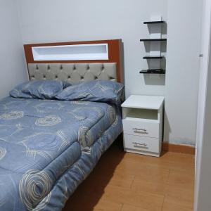 Ένα ή περισσότερα κρεβάτια σε δωμάτιο στο Renato's Hospedaje +8 φωτογραφίες