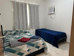 Ένα ή περισσότερα κρεβάτια σε δωμάτιο στο Apartamento em Condomínio Proximo ao Shopping +24 φωτογραφίες