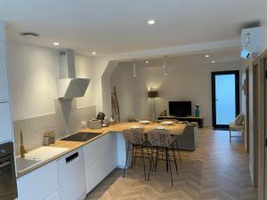 Η κουζίνα ή μικρή κουζίνα στο Appartement Le 2