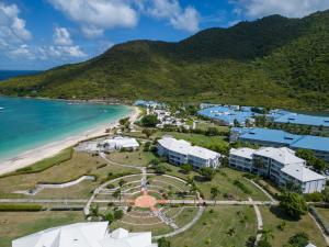 an aerial view of a resort next to the beach at Anse Marcel Cove Suites in Anse Marcel  +24 photos