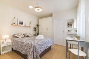 Postel nebo postele na pokoji v ubytování Madrid IFEMA suites