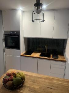 Η κουζίνα ή μικρή κουζίνα στο Modern 1 bedroom flat in Morden