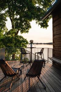 Φωτογραφία από το άλμπουμ του Lakefront log suite σε Lempaala