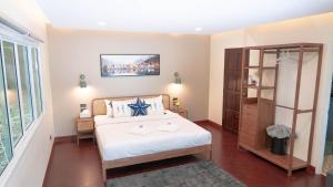 Katil atau katil-katil dalam bilik di Jaokhun Hilltop Patong, Phuket