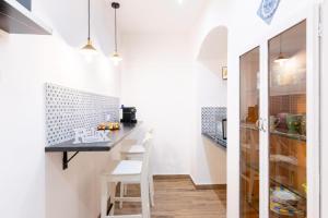 Kuchyň nebo kuchyňský kout v ubytování Balarm-Boutique Rooms