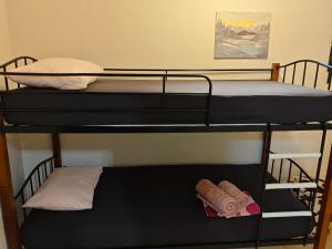 a couple of bunk beds in a room at studio apartment KAMARES in Mytilene