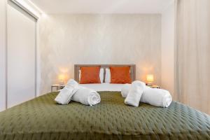 Ένα ή περισσότερα κρεβάτια σε δωμάτιο στο Garajau Sea Side by Atlantic Holiday