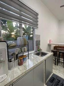Kuchyň nebo kuchyňský kout v ubytování Villa Panglima Private Pool