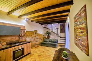 a living room with a couch and a table at Villa Cavetta in Agrigento