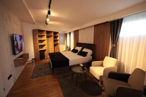 Μια τηλεόραση ή/και κέντρο ψυχαγωγίας στο BEST Apartments