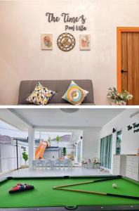 a living room with a pool table and a house at The time's pool villa in Ban Bung