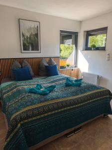 Postel nebo postele na pokoji v ubytování Waldoase im Nationalpark Eifel für 7 Gäste und max 2 Hunde in 1A Lage