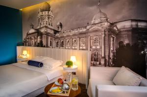 Voodi või voodid majutusasutuse Hotel Passport toas