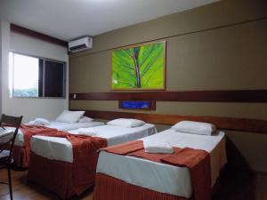 Katil atau katil-katil dalam bilik di Hotel Apollo