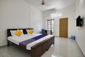 Imagen de la galería de Hotel O Al Ameen Punnapra, en Ambalapulai