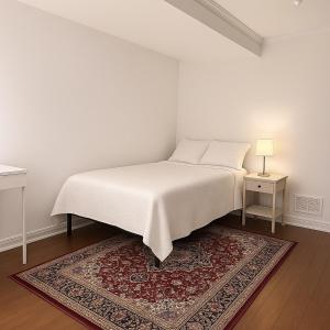 Katil atau katil-katil dalam bilik di Luxury and cozy 1BR Retreat