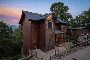a tiny house in the woods at sunset at Rainwater Falls in Gatlinburg