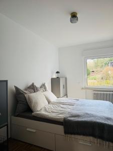 Llit o llits en una habitació de HeimHoch8