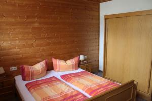 Postel nebo postele na pokoji v ubytování Haus Birgit