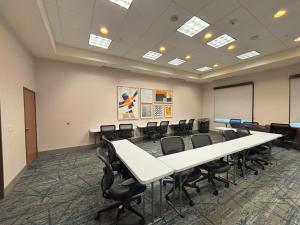 a conference room with white tables and chairs at Holiday Inn Express & Suites Truth or Consequences by IHG - Newly Renovated in Truth or Consequences +174 photos