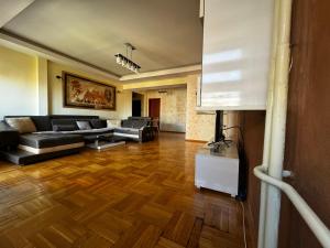 Χώρος καθιστικού στο Bela Apartment