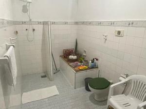 Koupelna v ubytování Nossa Casa + 10 fotografií