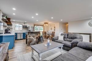 a living room with a couch and a table at Luxury Spacious House Great For A Family Retreat in Loveland