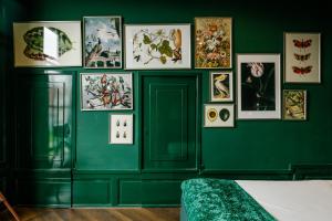 Postel nebo postele na pokoji v ubytování MAF Haarlem Boutique Hotel