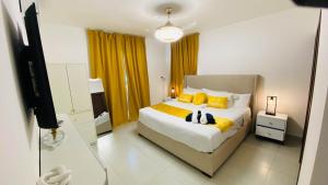 Postel nebo postele na pokoji v ubytování Modern Penthouse Albarobello Residences + 57 fotografií