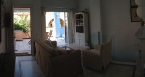 Ein Sitzbereich in der Unterkunft Apartamento Playa Muralla