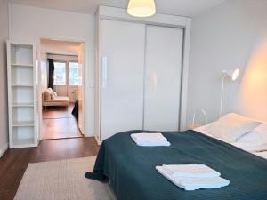 Postel nebo postele na pokoji v ubytování Central Apartment for 3 in Kuopio Center