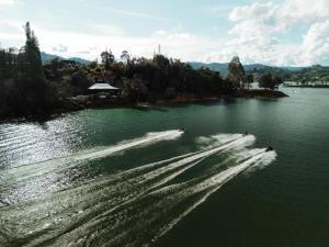 a couple of boats in a body of water at Porto Marina Hotel in Guatapé
