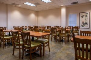 a dining room with tables and chairs at SW Hotel in San Francisco
