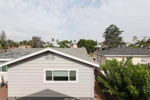 a white house with a window on top of it at Modern Loft Retreat - North Park San Diego in San Diego +9 photos