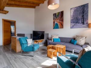 TV a/nebo společenská místnost v ubytování Green Garden Lodge A1
