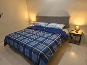 Ένα ή περισσότερα κρεβάτια σε δωμάτιο στο Departamentos Deluxe Villas Campestre